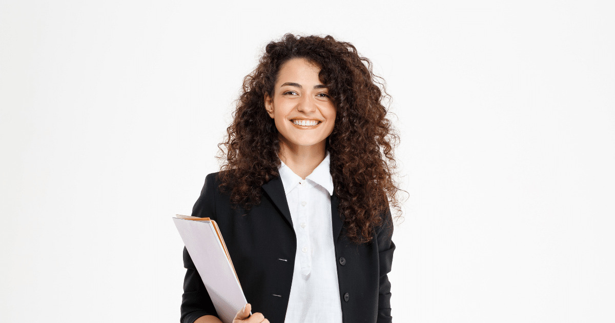 Smiling businesswoman holding documents, representing growth opportunities for small businesses in online shopping.