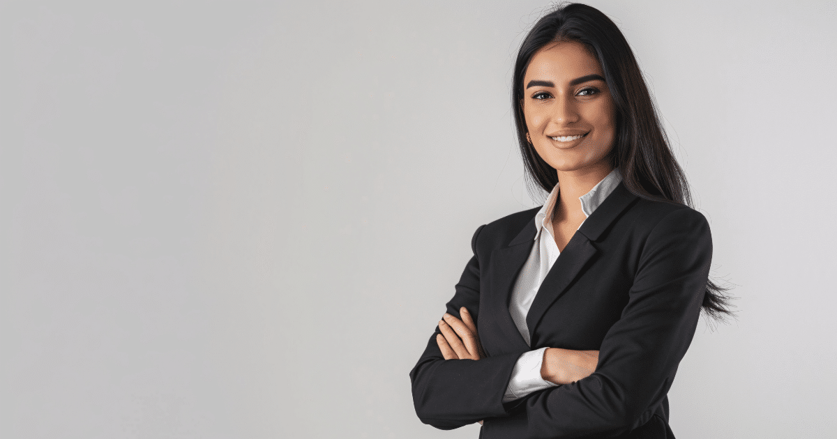 Professional woman in business attire promoting corporate social responsibility and community impact.